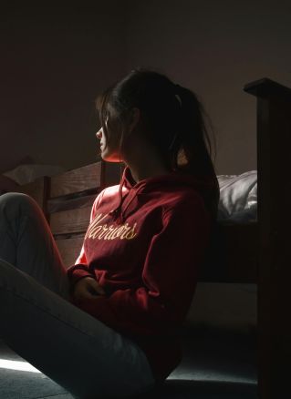 Photo Of Woman Sitting On Floor